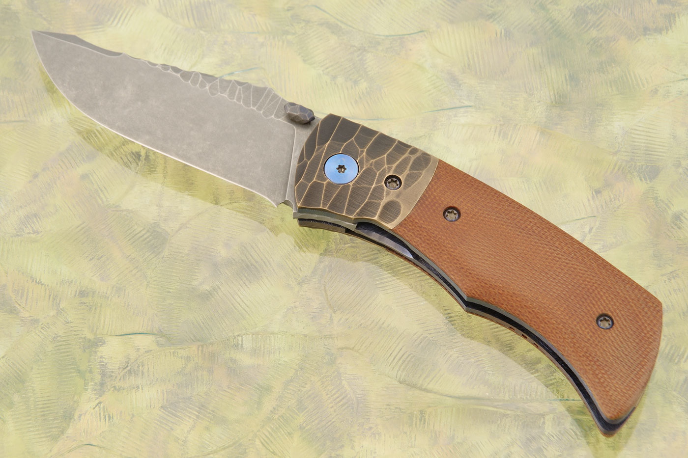 Linerlock Front Flipper with Sculpted Bronze and Micarta