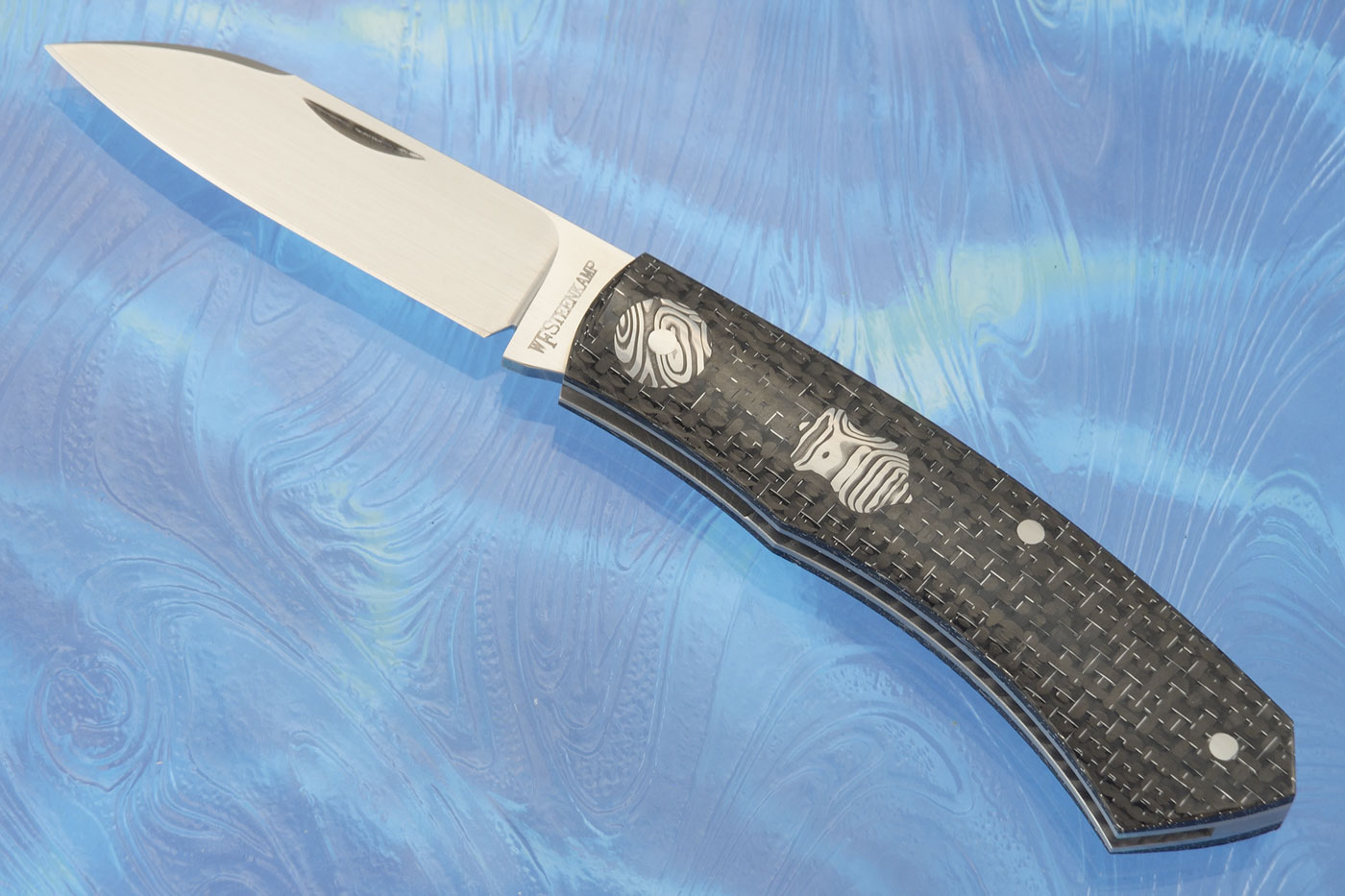 Dino Slipjoint with Silver Strike Carbon Fiber and Damascus - M390
